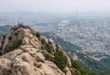 Walking Korea’s Mountains ① Gwanaksan Rocky summit view of Gwanaksan overlooking Seoul on a hazy day