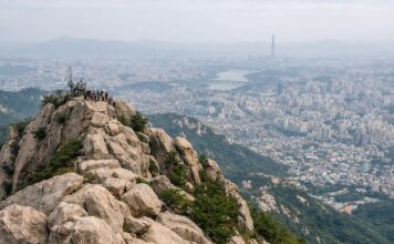 Walking Korea’s Mountains ① Gwanaksan Rocky summit view of Gwanaksan overlooking Seoul on a hazy day